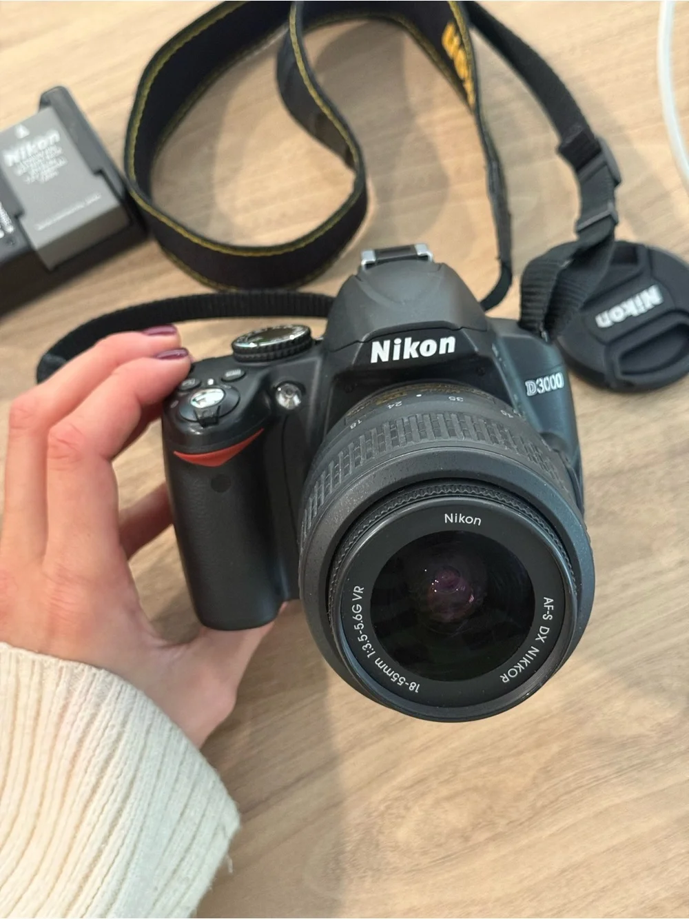 Nikon DSLR Camera Kit with Black Body and Red-Accented Bag